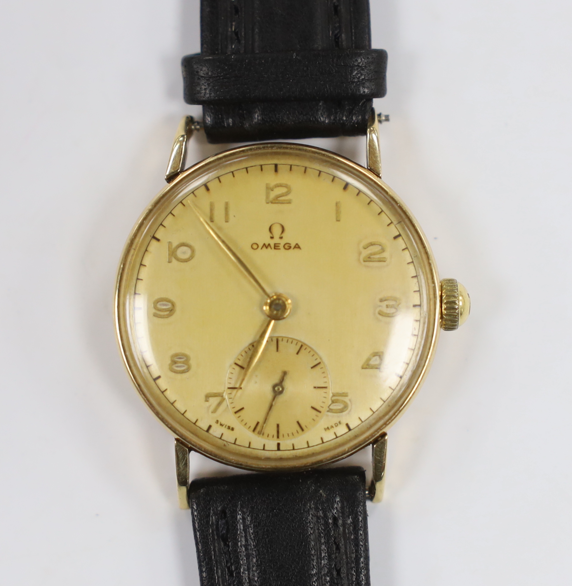 A gentleman's mid 1940's 14ct gold Omega manual wind wrist watch, movement c.26.5.T3, case diameter 31mm, on later associated leather strap.